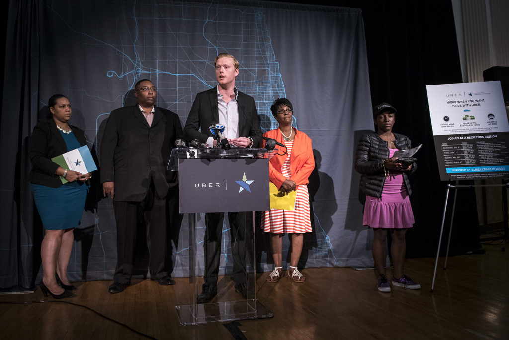 Andrew Macdonald (Regional General Manager, Uber) helps kick off Uber's effort to connect 10,000 Chicagoans to flexible income earning opportunities. Joined by (left to right) Phaedra M. Leslie (Chicago Cook Workforce Development), Ald. Jason Ervin (28th), Ald. Emma Mitts (37th) and Bree R. (Uber driver-partner).